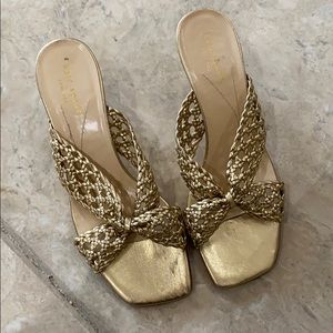 Kate Spade gold kitten heel mules.
